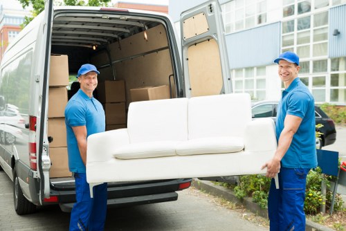 Removalists preparing furniture for a local house move