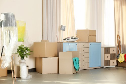 Moving van and boxes outside a residential home for a local move