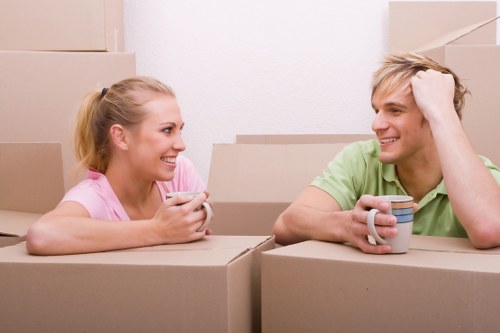 Man and van removals team loading furniture for a local move in Movingservices