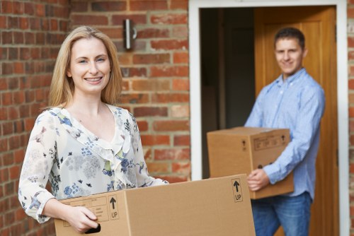 Moving crew coordinating logistics and transport during a relocation