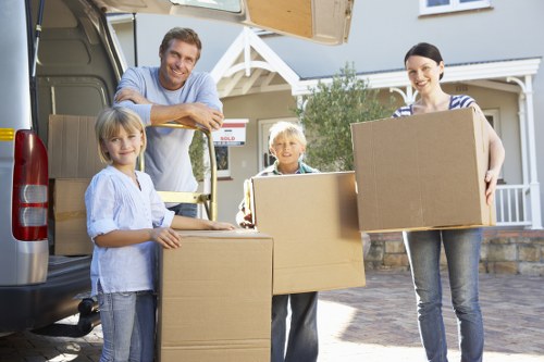 Staff training in safe lifting and handling techniques during a house move