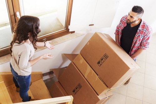 Moving truck outside a suburban home during a relocation